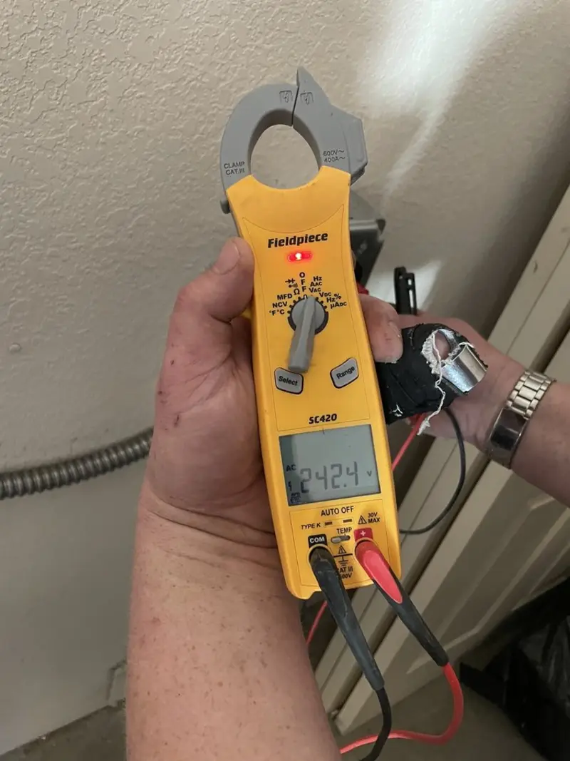 Voltage testing with clamp meter during Generator Installation in Napa